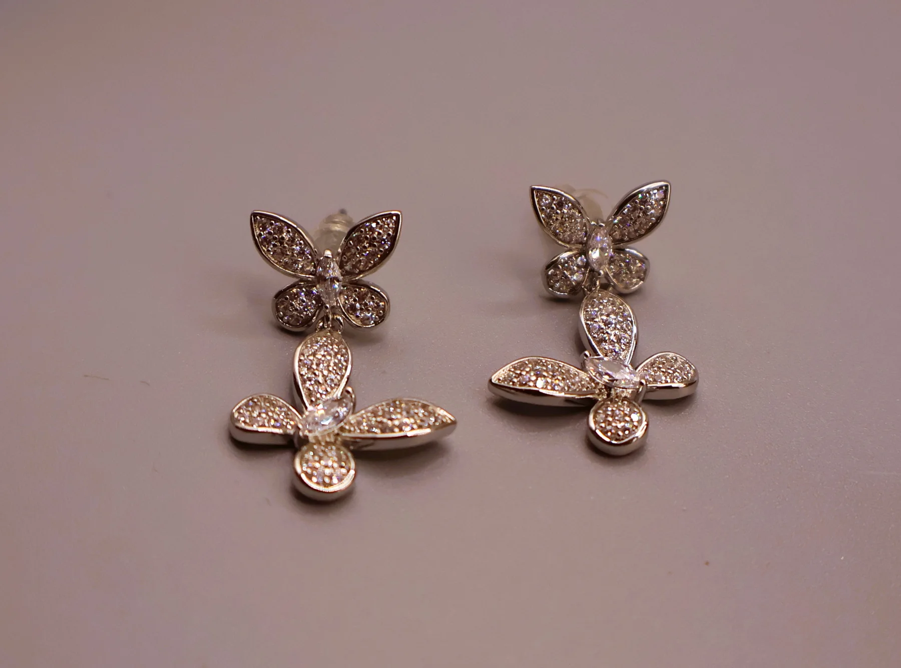 Silver-tone botanical butterfly and leaf crystal drop earrings