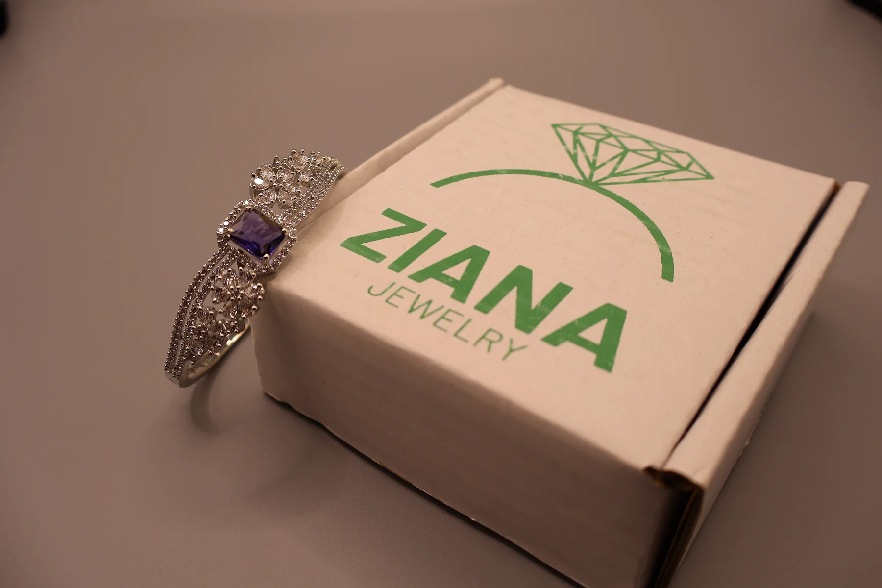 Royal Amethyst Crest Crystal Bangle – styled product view