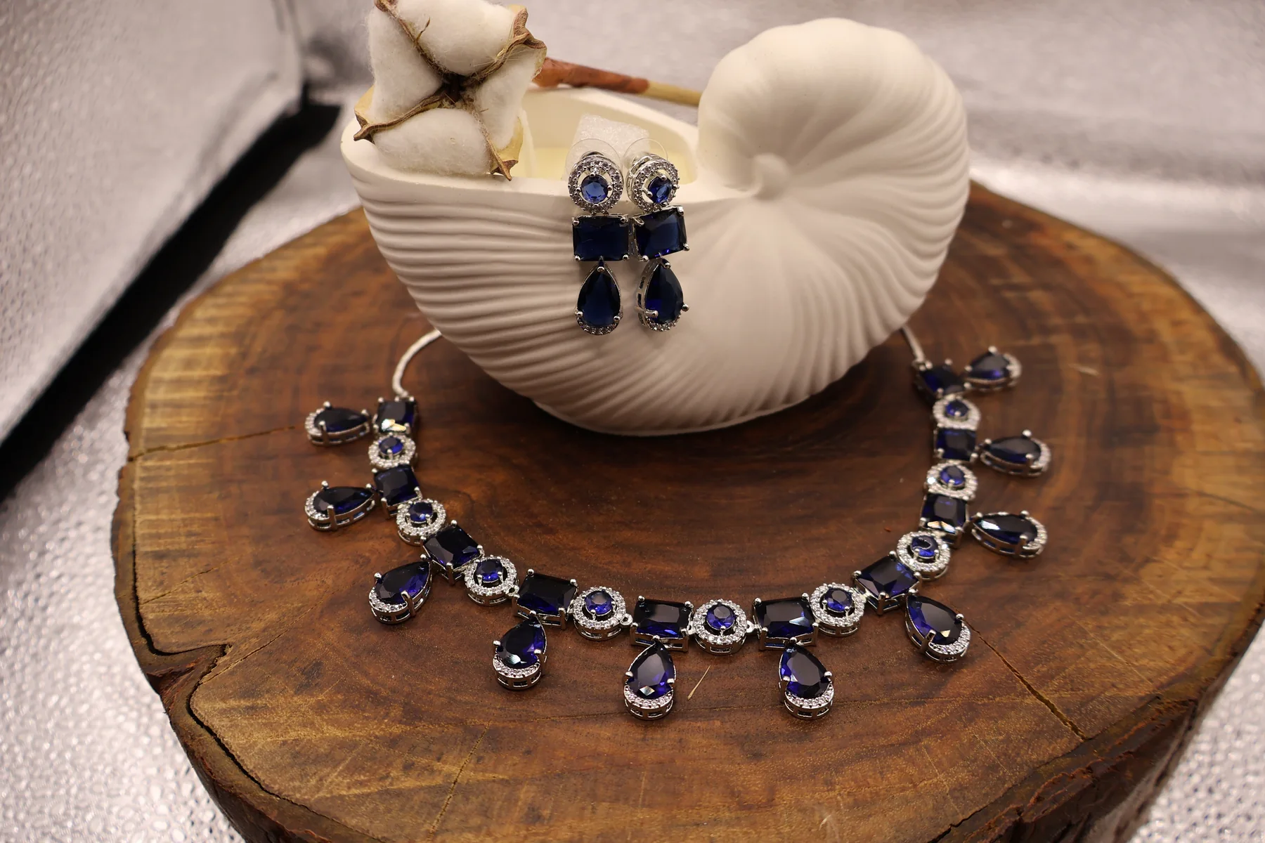 Close view of royal sapphire necklace set with geometric stones